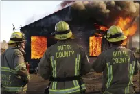  ??  ?? From left to right, Ethan Elvis, Jeremy Kenkel and Michael Townzen of Cal Fire-Butte County attend a burn training Saturday in Durham.