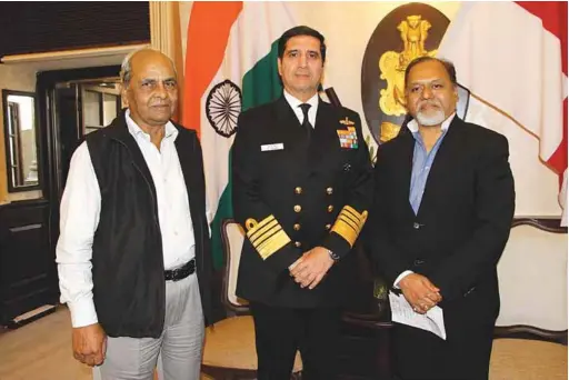  ??  ?? Chief of the Naval Staff Admiral R.K. Dhowan with Rear Admiral Sushil Ramsay (Retd) and Jayant Baranwal (right)