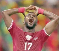  ?? — Reuters ?? Qatar’s Ismail Mohamad reacts after a missed chance to score.