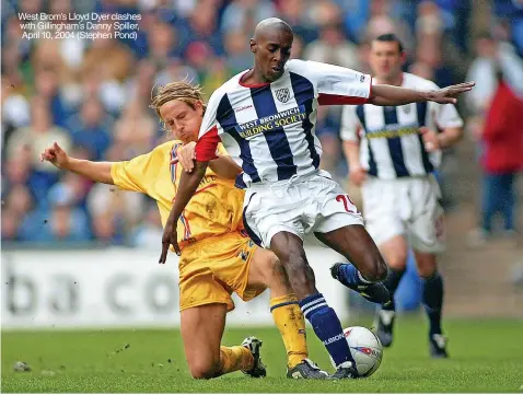  ?? ?? West Brom’s Lloyd Dyer clashes with Gillingham’s Danny Spiller, April 10, 2004 (Stephen Pond)