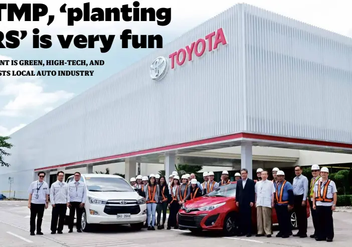  ??  ?? Top executives of Toyota Motor Philippine­s and members of the media pose alongside the Innova and Vios cars which are both manufactur­ed at the Sta. Rosa plant.