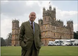  ?? PHOTOS COURTESY OF FOCUS FEATURES ?? “Downton Abbey” creator Julian Fellowes poses for a photo on the set of the new film “Downton Abbey: A New Era.”