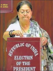  ?? PTI ?? Rajasthan CM Vasundhara Raje casts her vote during the Presidenti­al election in Jaipur on Monday.