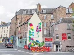  ?? Picture: Steve MacDougall ?? The colourful mural begins to take shape.