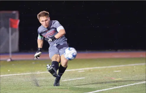  ?? H John Voorhees III / Hearst Connecticu­t Media ?? Matt Silva, goalie for the Danbury High School Hatters varsity soccer team during their game against Norwalk High School on Wednesday night at Danbury High School.