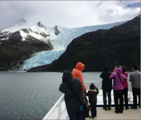  ?? Rob Owen/Post-Gazette photos ?? Cruise ships going around the tip of South America sail through the Beagle Channel, passing multiple glaciers en route. Penguins are the sight to see on the beaches of the Falkland Islands.