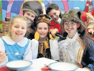  ??  ?? Pictured from left to right are Georgie Sanders as Belle, William Barrett as Cogsworth, Phoebe Thomson as Lumiere, Henry Fraser as Gaston and James Hartley as the eponymous Beast. Beauty and the Beast