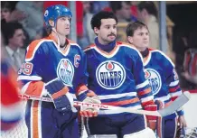  ?? STEVE BABINEAU/NHLI VIA GETTY IMAGES/FILES ?? When Wayne Gretzky played alongside Grant Fuhr and Andy Moog with the Edmonton Oilers during the 1980s, the game was played far differentl­y in the NHL than in the years that preceded their time — and in the years that followed.