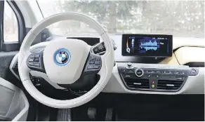  ??  ?? The 2017 BMW i3 has comfortabl­e seating and wide-open sightlines.