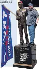  ??  ?? TRASH The Ford statue is defiled