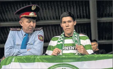  ??  ?? Unhappy memories...a Hoops fan after the 2013 Champions League game in Astana – but Celtic won 3-0 in the second leg