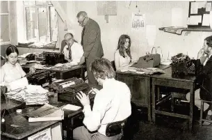  ??  ?? ●»Above: The Advertiser reporter’s room in 1970 still using manual typewriter­s of the 1930s. Norman Wright (smoking pipe) with editor Roger Ward and young reporters ●»Left: One of George Greenhough’s action shots of the air crash
