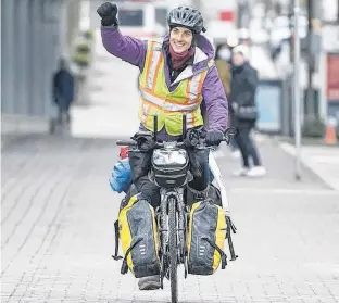  ?? POSTMEDIA NEWS ?? liajah Pidskalny finishes a cycling trip he began in Saskatoon on New Year’s Day, raising awareness of the opioid crisis and harm reduction.