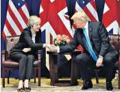  ??  ?? Theresa May meets Donald Trump, the US president, on the sidelines of the United Nations General Assembly in New York