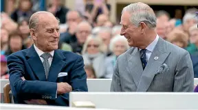  ?? GETTY IMAGES ?? The Duke of Edinburgh with Prince Charles in 2016, above, and catching up with grandson Prince Harry in 2019.