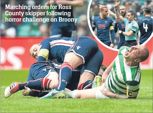  ??  ?? Ross County’s Andrew Davies saw red for this tackle on Scott Brown that left Celtic boss Brendan Rodgers raging –