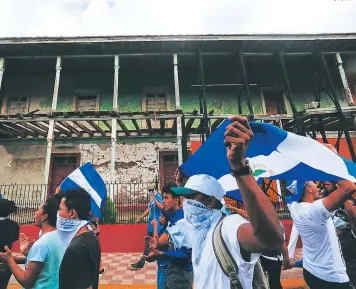  ?? FOTO: AFP ?? Los nicaragüen­ses piden la salida de Daniel Ortega del poder.