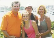  ?? Associated Press ?? This June 2007 photo provided by Dr. William Petit Jr. shows Petit, left, with his daughters Michaela, front, Hayley, center rear, and his wife, Jennifer HawkePetit, on Cape Cod, Mass.