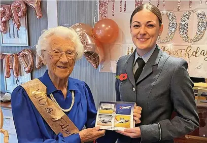  ?? Picture: Ministry of Defence ?? Eileen Mary Blythe celebratin­g her 100th birthday with Flying Officer Eve Westlake