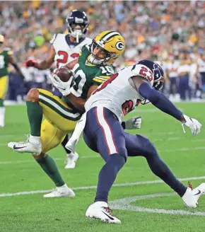  ?? DAN POWERS / USA TODAY NETWORK-WISCONSIN ?? Packers wide receiver Darrius Shepherd scores a touchdown against Texans defensive back Johnson Bademosi.