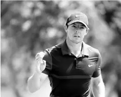  ?? - AFP photo ?? Rory McIlroy of Northern Ireland waves to the gallery on the sixth green during the round of 8 in the World Golf Championsh­ips-Dell Match Play at the Austin Country Club on March 26, 2016 in Austin,Texas.