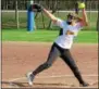  ?? BY NICK TOPPING — NTOPPING@ DIGITALFIR­STMEDIA.COM ?? Molly O’Reilly winds up for a pitch during Saratoga Catholic’s 4-3 win over Whitehall. O’Reilly went seven strong innings allowing seven hits and three runs, while striking out three.