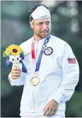  ?? AFP ?? Xander Schauffele of the US with his gold medal at Tokyo Games.