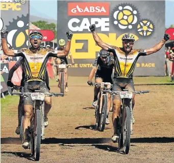  ?? Picture: SHAUN ROY/CAPE EPIC/SPORTZPICS ?? DOMINANT FORCE: Manuel Fumic and Henrique Avancini, of Cannondale Factory Racing, celebrate after winning Stage 2 of the 2018 Absa Cape Epic Mountain Bike stage race held at Arabella Wine Estate in Robertson yesterday