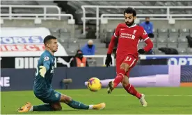  ??  ?? Liverpool’s Mohamed Salah sees his first-half effort saved by the Newcastle goalkeeper Karl Darlow. Photograph: Stu Forster/AP