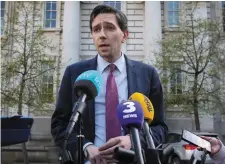  ??  ?? Health Minister Simon Harris met with Opposition TDs last night to agree a path forward. Photo: Gareth Chaney