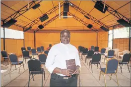  ?? PHOTOS BY BRIAN INGANGA — AP PHOTO ?? Associate Pastor Caroline Omolo stands for a portrait at the Cosmopolit­an Affirming Community church, which serves a predominan­tly LGBTQ congregati­on, in Nairobi, Kenya. “They have always organized a group to maybe silence us or make the church disappear,” Omolo says. “They don’t want it to appear anywhere.”