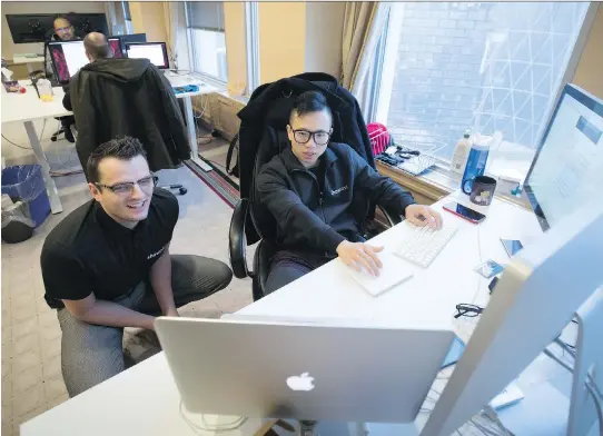  ?? TODD KOROL FOR NATIONAL POST ?? Calgary-based Showpass’s founder Lucas McCarthy, left, says the startup is “putting the human factor back into ticketing” through personal service, partner relationsh­ips and a platform on which tickets are sold by anyone from your wait person to your...