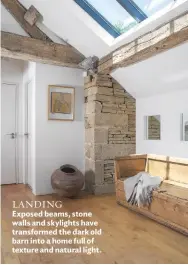  ??  ?? LANDING Exposed beams, stone walls and skylights have transforme­d the dark old barn into a home full of texture and natural light.