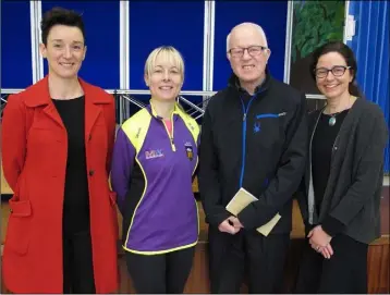  ??  ?? At the presentati­on: Siobhan O’Shea, St Senan’s parents associatio­n, Karen Murphy, who raised money by participat­ing on the Dublin City Marathon, Richie Healy of Enniscorth­y Men’s Shed, and Oonagh Rackard, principal, St. Senan’s.