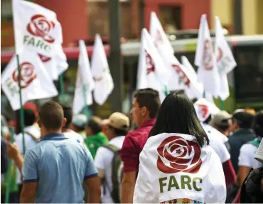  ?? Foto: AFP/Raúl Arboleda ?? FARC-Mitglieder und -Anhänger feiern den Übergang von der Guerilla zur politische­n Partei.