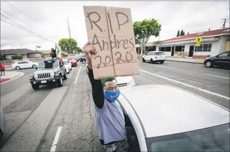  ?? Jason Armond Los Angeles Times ?? A RALLY in Gardena in June for Andres Guardado, 18, who was shot and killed in an incident outside an auto body shop.