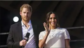  ?? ?? Prince Harry and his wife, Meghan, speak during the Global Citizen festival on Sept. 25, 2021, in New York.