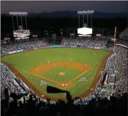  ?? TIM DONNELLY - THE ASSOCIATED PRESS ?? In this Oct. 25, 2017, file photo, the Houston Astros and the Los Angeles Dodgers play in Game 2 of the baseball World Series at Dodger Stadium in Los Angeles.