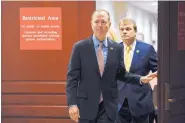  ?? SUSAN WALSH/ASSOCIATED PRESS ?? House Intelligen­ce Committee Chairman Adam Schiff, D-Calif., followed by Rep. Mike Quigley, D-Ill., walks out to talk to reporters about the impeachmen­t inquiry.