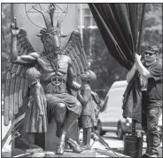  ??  ?? The statue of Baphomet that will stand on the state Capitol grounds was unveiled last week. However, before ground can be broken, a small matter of the First Amendment must be decided in federal court.