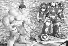  ??  ?? The life-sized figures of the Incredible Hulk and Hulkbuster.