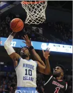  ?? Photo by Paul J. Spetrini / The Independen­t ?? URI ended the regular season with four straight victories, including Saturday’s 94-75 A-10 regular-season finale over UMass at the Ryan Center.