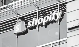  ?? JUSTIN TANG/CANADIAN PRESS ?? Canadian e-commerce company Shopify said in June that it would get into the fulfillmen­t business, rivaling Amazon.