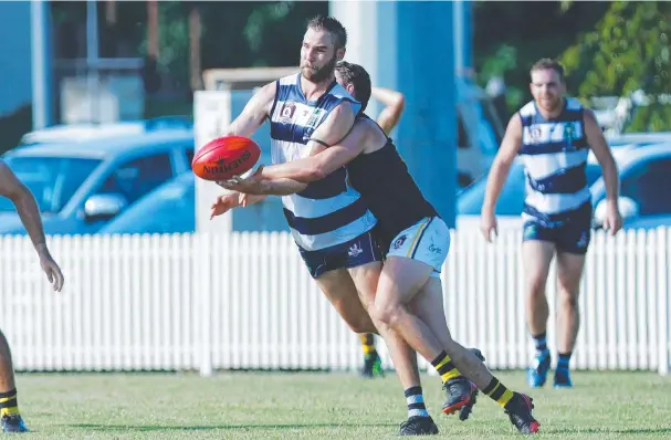  ?? Picture: Brendan Radke ?? Port Douglas’ Ethan McCullough disposes of the ball in the round 1 clash with the North Cairns Tigers. The Crocs are unbeaten after four games.