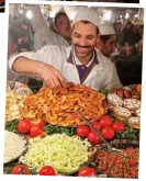 ??  ?? Enticing: Delicious food at the Jemaa el-Fnaa market (top)