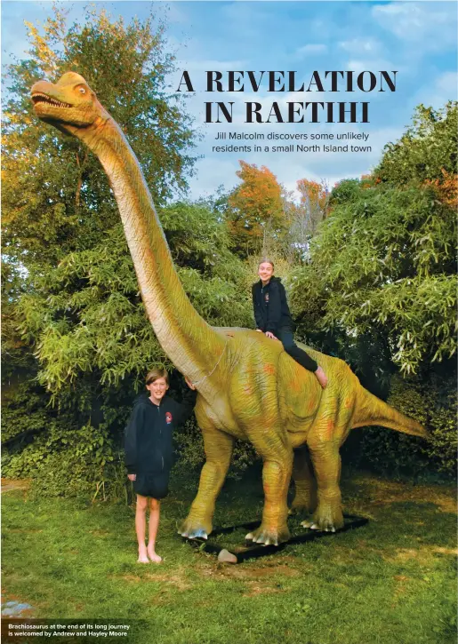  ??  ?? Brachiosau­rus at the end of its long journey is welcomed by Andrew and Hayley Moore