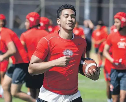  ?? Mark Boster For The Times ?? BRYCE YOUNG became the first African American quarterbac­k in Mater Dei history last season and wound up passing for 3,846 yards and 39 touchdowns. The Monarchs finished 13-2 and won a mythical national championsh­ip. He has committed to USC.