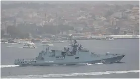  ?? (Murad Sezer/Reuters) ?? THE RUSSIAN FRIGATE ‘Admiral Grigorovic­h’ sails in the Bosphorus near Istanbul on its way to the Mediterran­ean Sea last November.