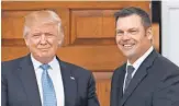  ?? CAROLYN KASTER, AP ?? A document held by Kris Kobach during ameeting with Donald Trump has become the focus of an ACLU lawsuit and ordered released to the group.