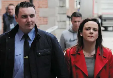  ?? Photo: Stephen Collins/Collins Photo ?? Garda Keith Harrison and his partner Marisa Simms arrive at Dublin Castle.